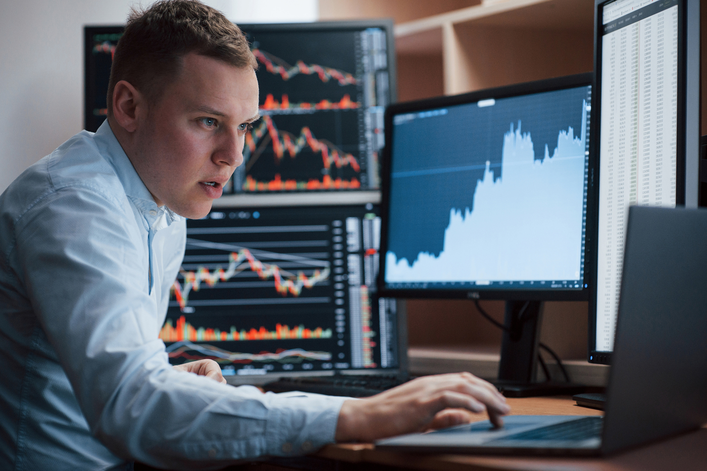Traders review stock charts, share price action, learn to trade